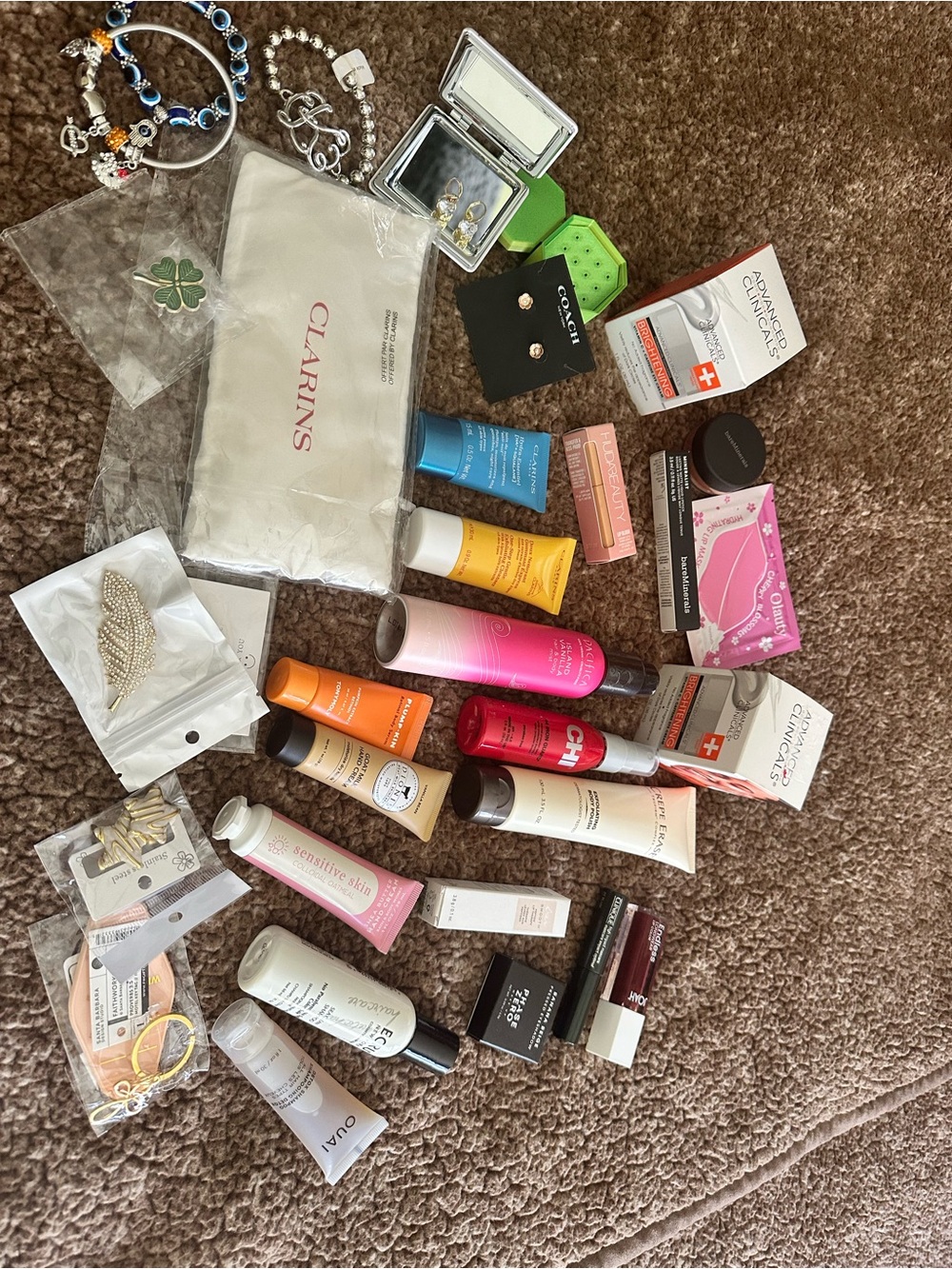 Clarins, Coach, Bare Minerals, Clinique and more 32 items